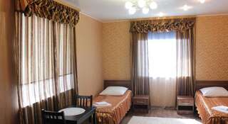 Гостиница Норд Салехард Улучшенный двухместный номер с 2 отдельными кроватями-1